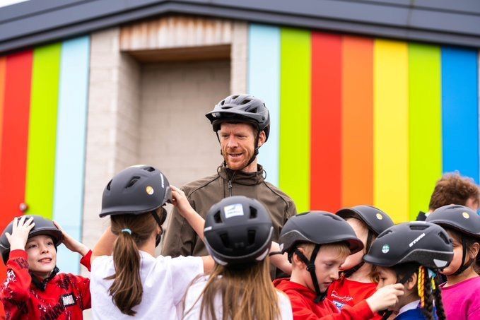 Ed Clancy with primary school children in Barnsley